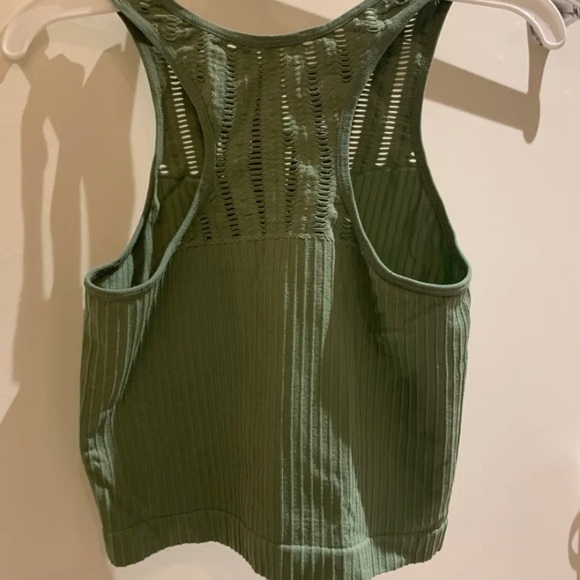 Bought from winners, green crop top with cut outs on the top in size small - Picture 2 of 2